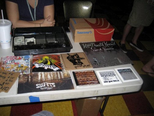 my stuff on the merch table!